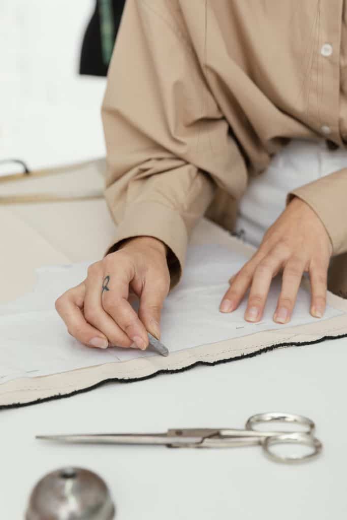 Designer working in her workshop alone