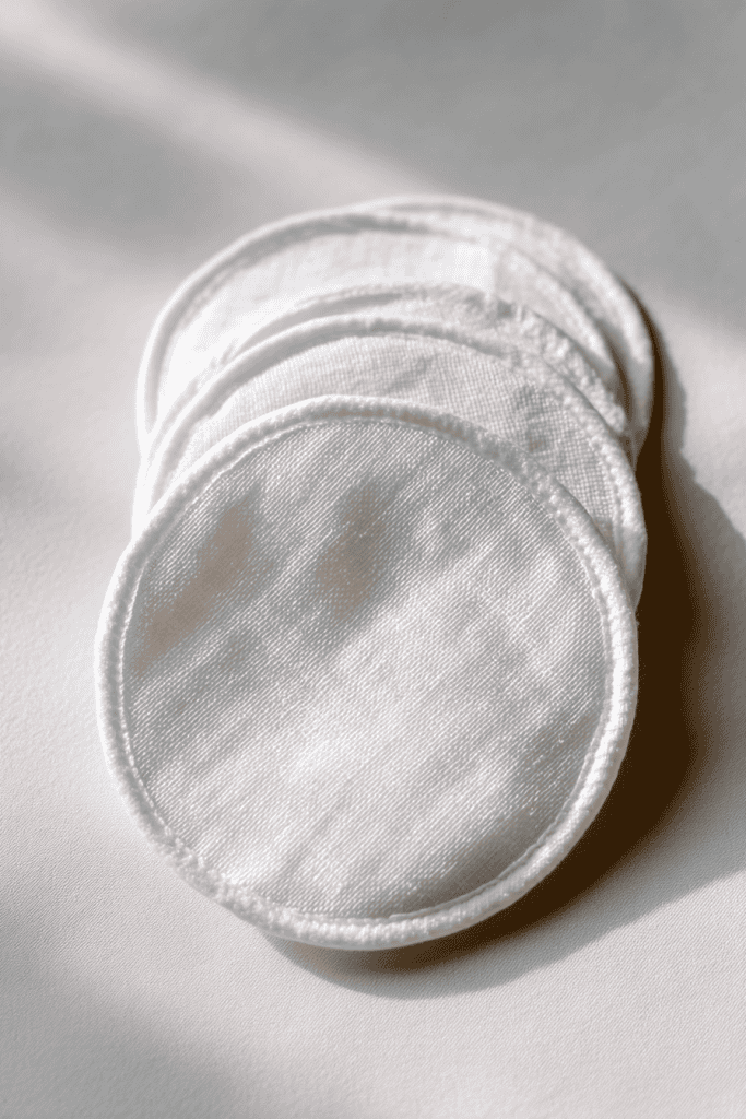 Close-up of washable nursing pads, clean bright white background
