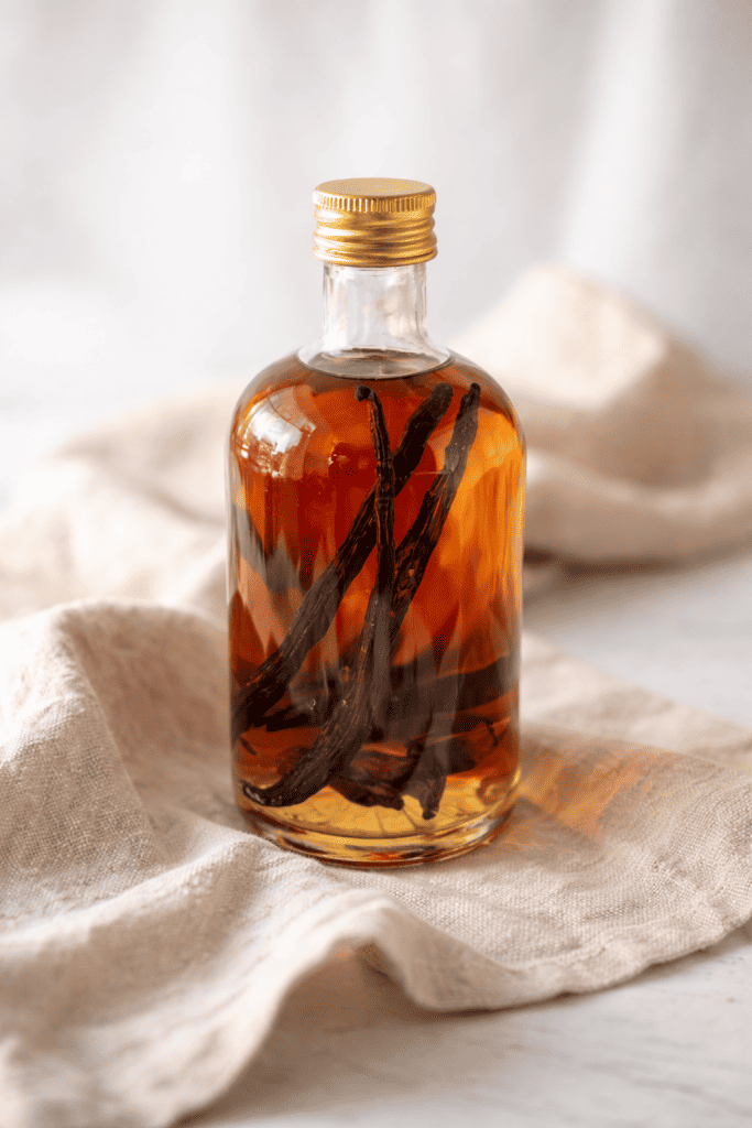 Homemade vanilla extract in glass bottle