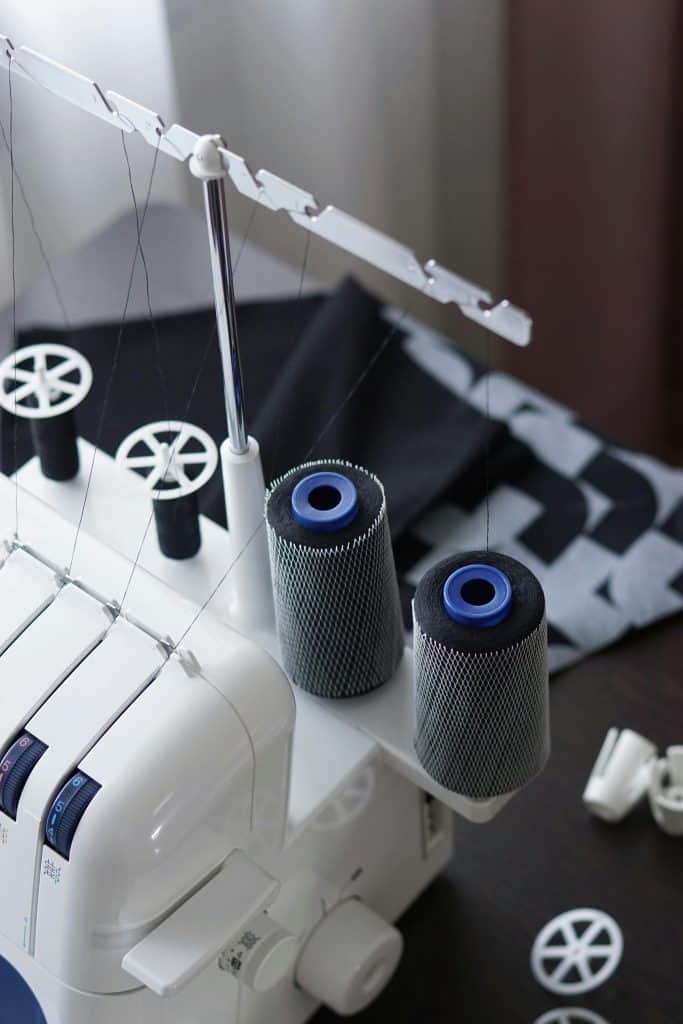 a close up image of a Overlock Sewing Machine