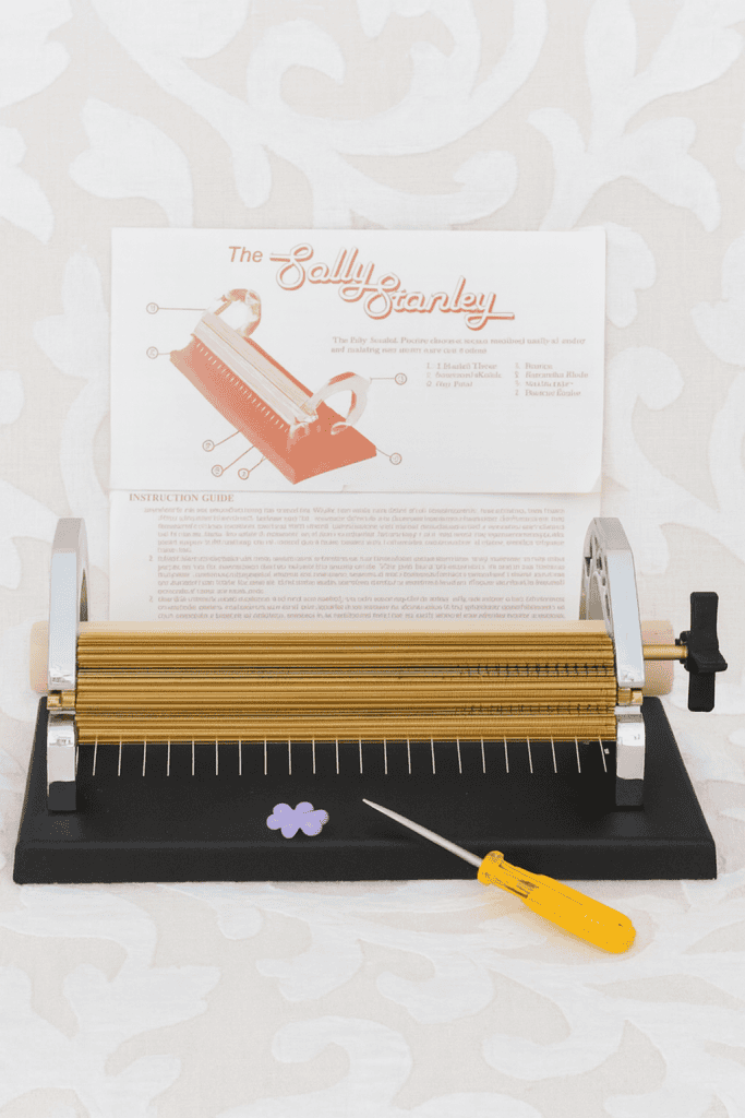 a vintage-style pleating or smocking machine, specifically inspired by the iconic Sally Stanley pleater.