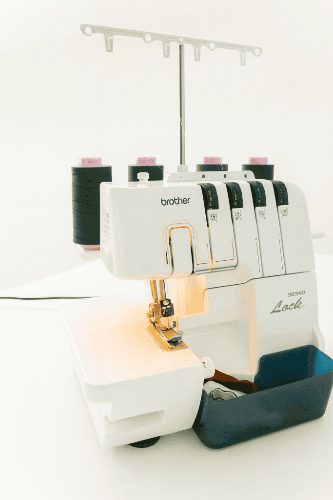 a serger machine put in a white table