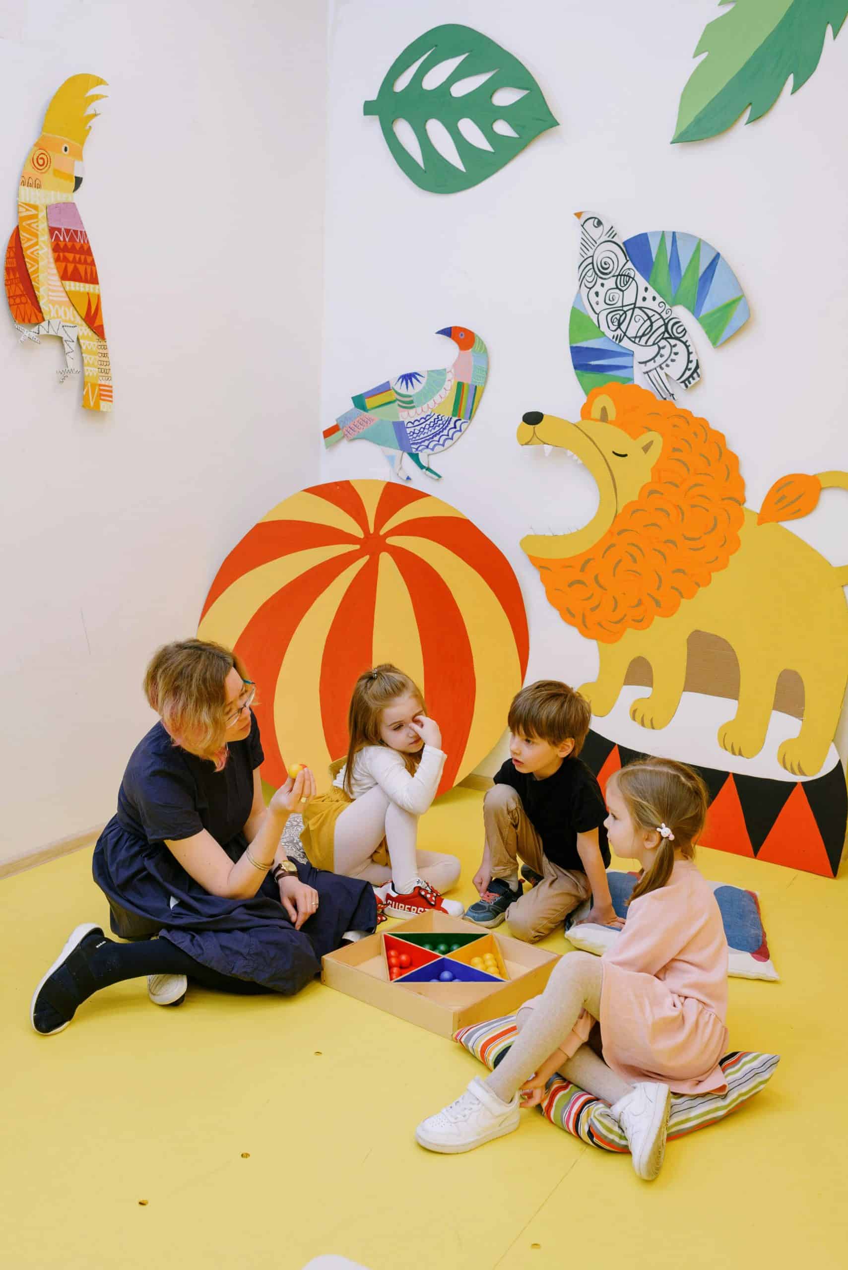 a preschool or kindergarten classroom setting featuring a playful and engaging learning session