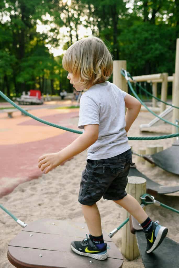 A boy playing in a playground