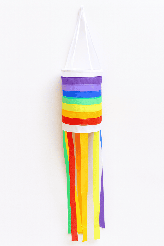 a handmade rainbow windsock craft designed for a children’s classroom or Sunday School setting