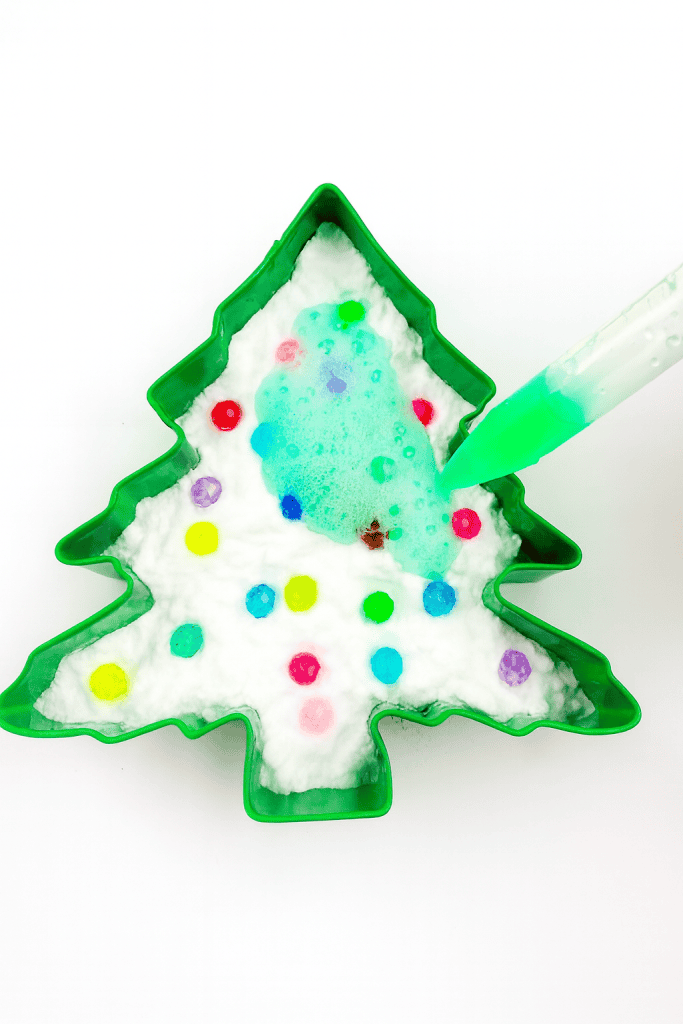 a Christmas-themed science and sensory activity involving baking soda and vinegar