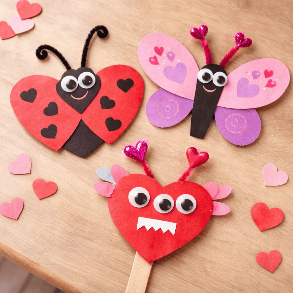 finished handmade Heart-Shaped Love Bugs and Critters crafted from colorful construction paper.