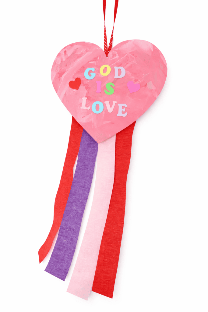 a handcraftedd “God Is Love” Valentine windsock