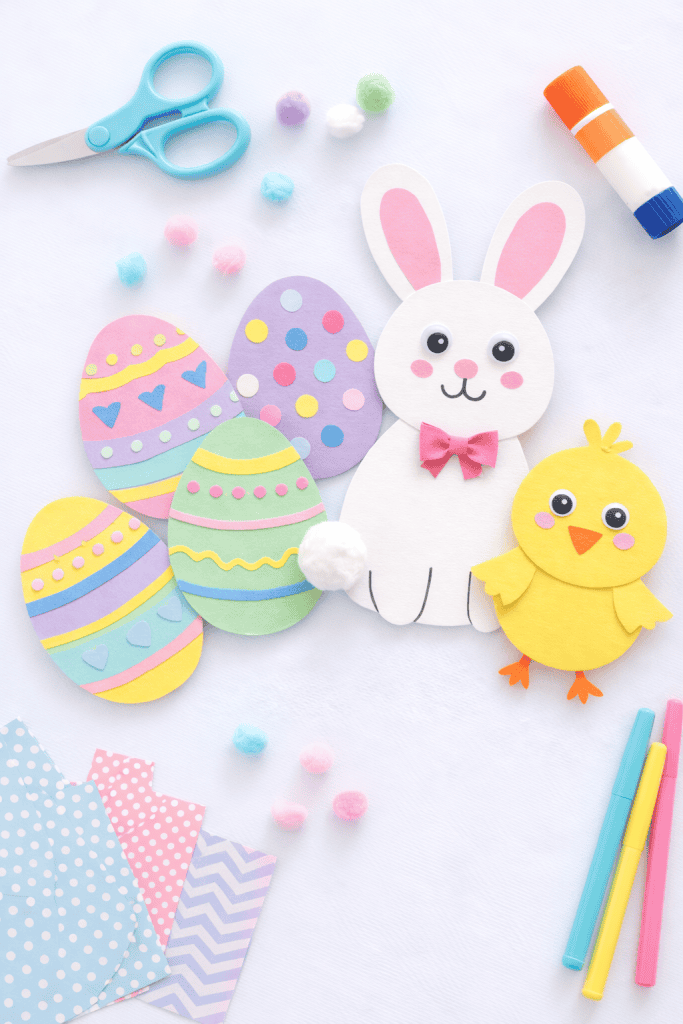 a cheerful handmade Easter project such as decorated paper eggs, a bunny craft made from construction paper, and a small chick craft.