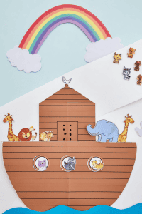 a colorful Noah’s Ark-themed children’s craft made from paper cutouts and stickers.