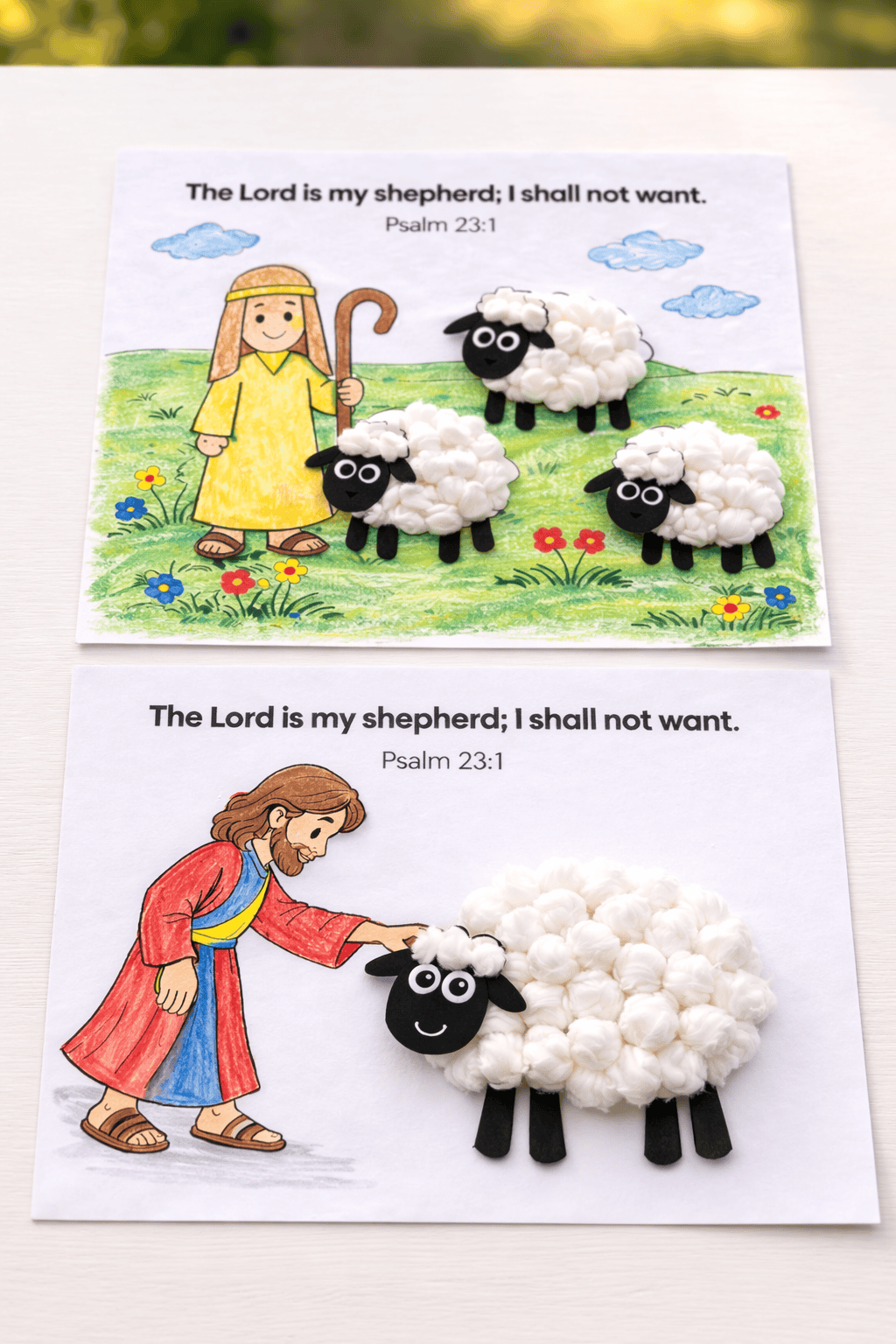 Two completed Psalm 23 sheep crafts made with cotton balls placed on printed Bible activity pages, showing “The Lord is my shepherd; I shall not want. Psalm 23:1,” with a shepherd scene and fluffy 3D cotton ball sheep.