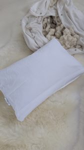 a white DIY cotton fabric pillow