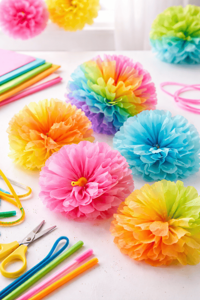 colorful tissue paper pom-pom flowers crafted by kids.