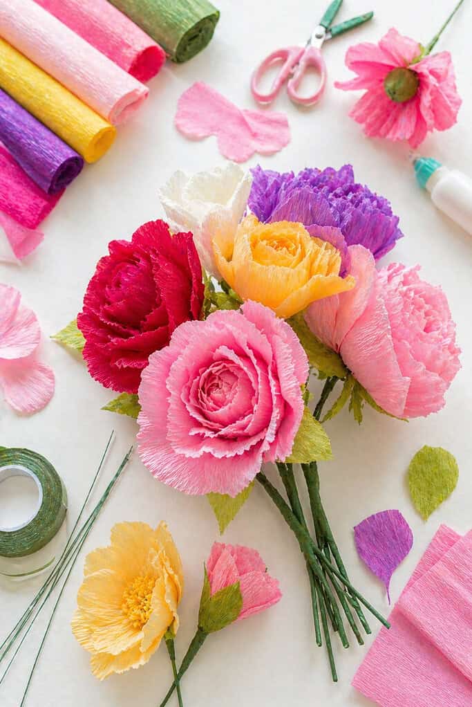 a small bouquet of handmade crepe paper flowers designed to look soft and realistic
