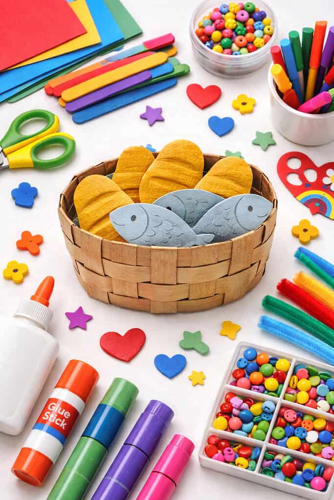 Handmade craft basket with loaves and fish