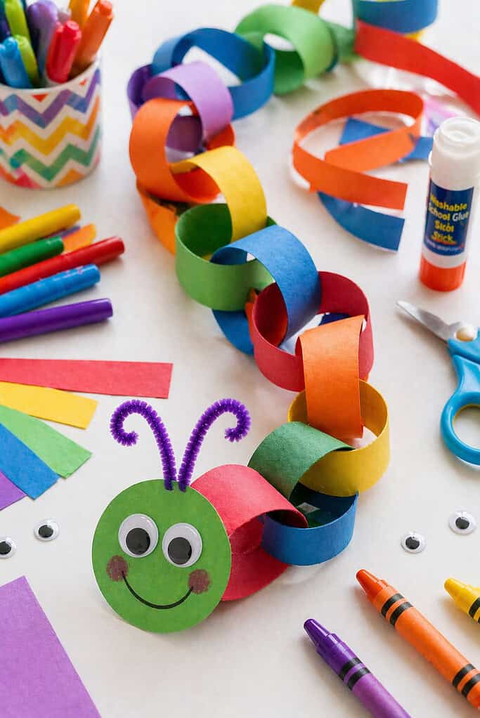 a long, colorful paper chain made from looped strips of construction paper.