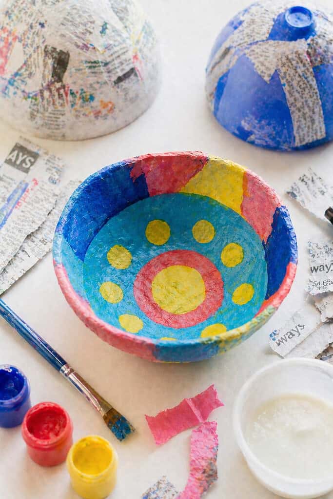 a finished paper mâché bowl with a slightly uneven, organic shape