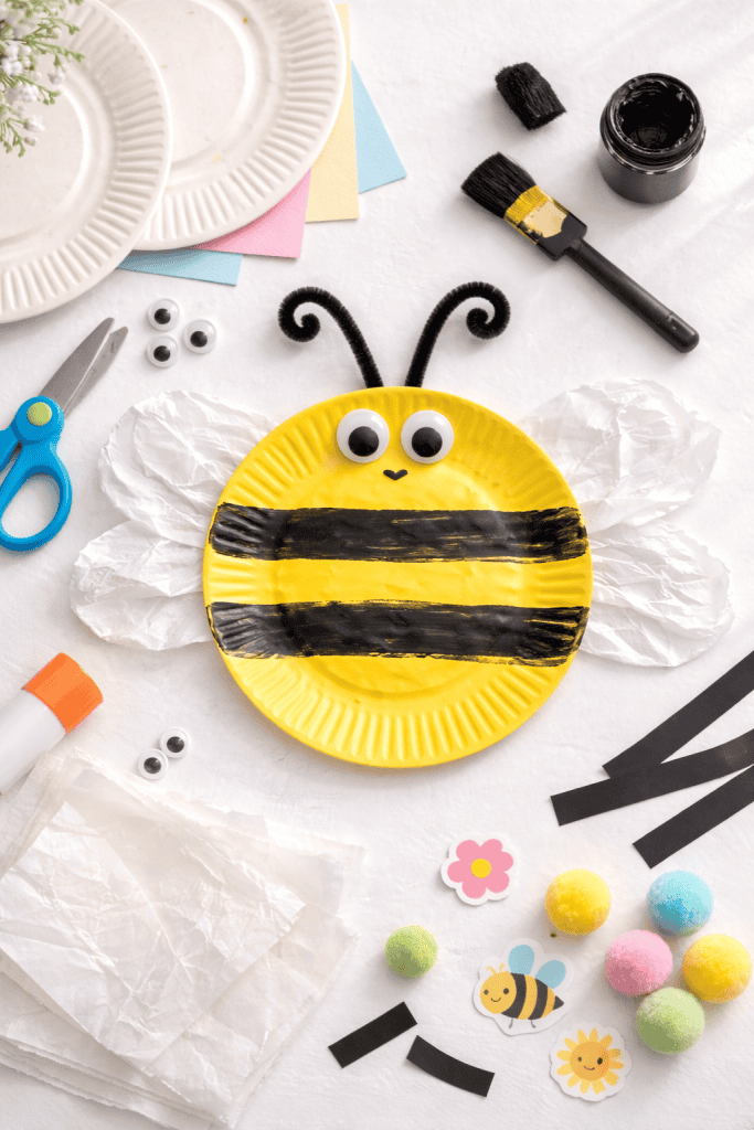 a decorated paper plate bumble bee