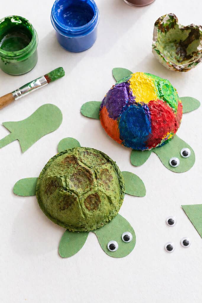 two small turtles made from single egg carton cups used as the shell.