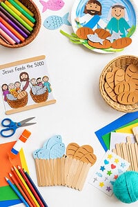 craft elements that visually represent the biblical story of Jesus feeding the 50
