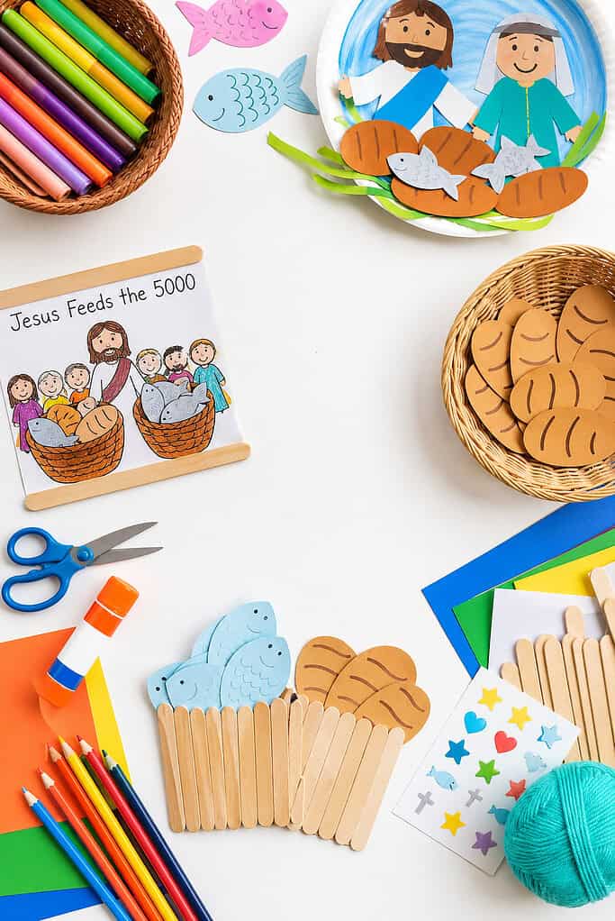 craft elements that visually represent the biblical story of Jesus feeding the 50