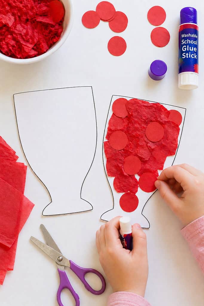 two small paper cup shapes cut from white cardstock.