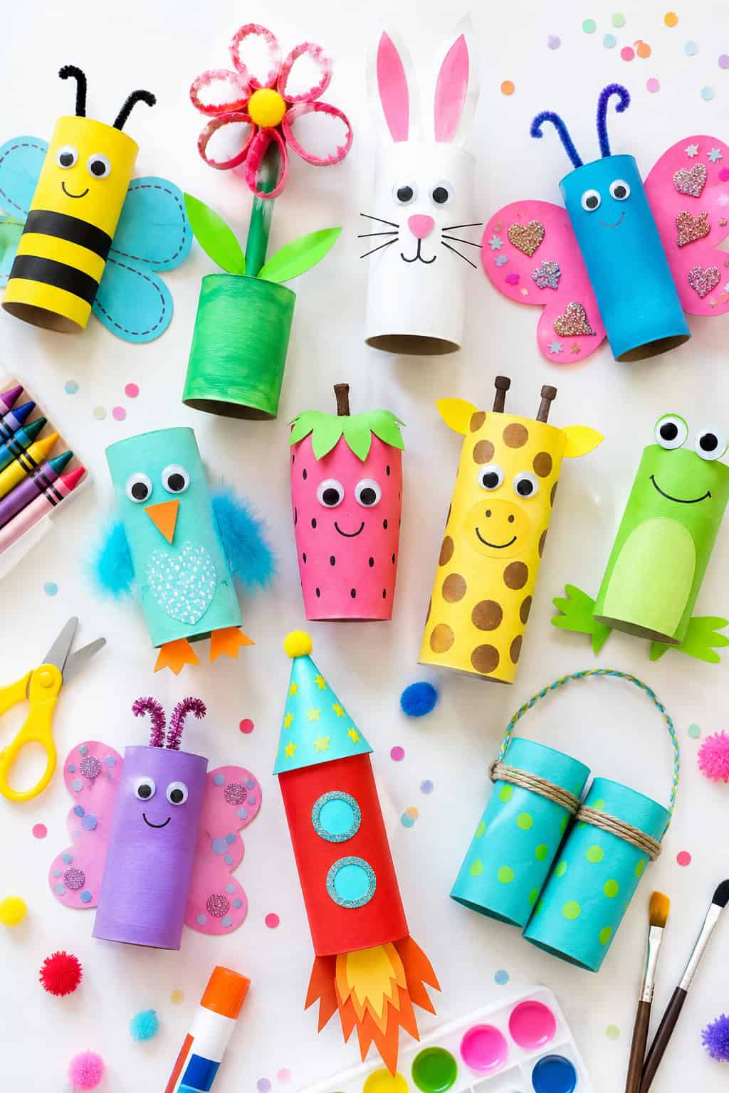 a playful assortment of colorful DIY crafts made from recycled toilet paper rolls