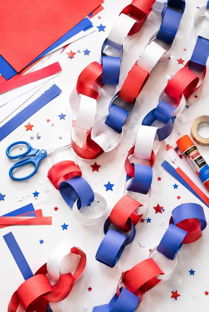 handmade paper chains created from red, white, and blue construction paper strips