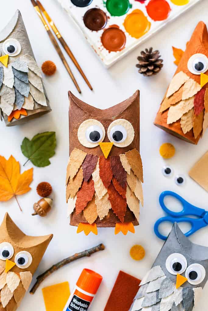 an adorable handmade owl created from a recycled toilet paper roll