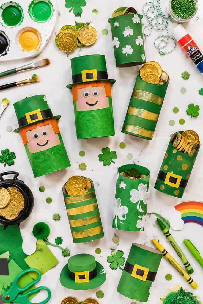 handmade leprechaun and shamrock-inspired decorations created from recycled toilet paper rolls
