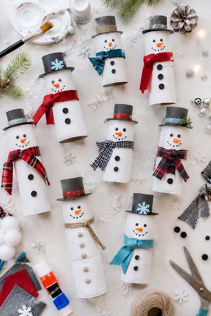 handmade snowmen created from recycled toilet paper rolls