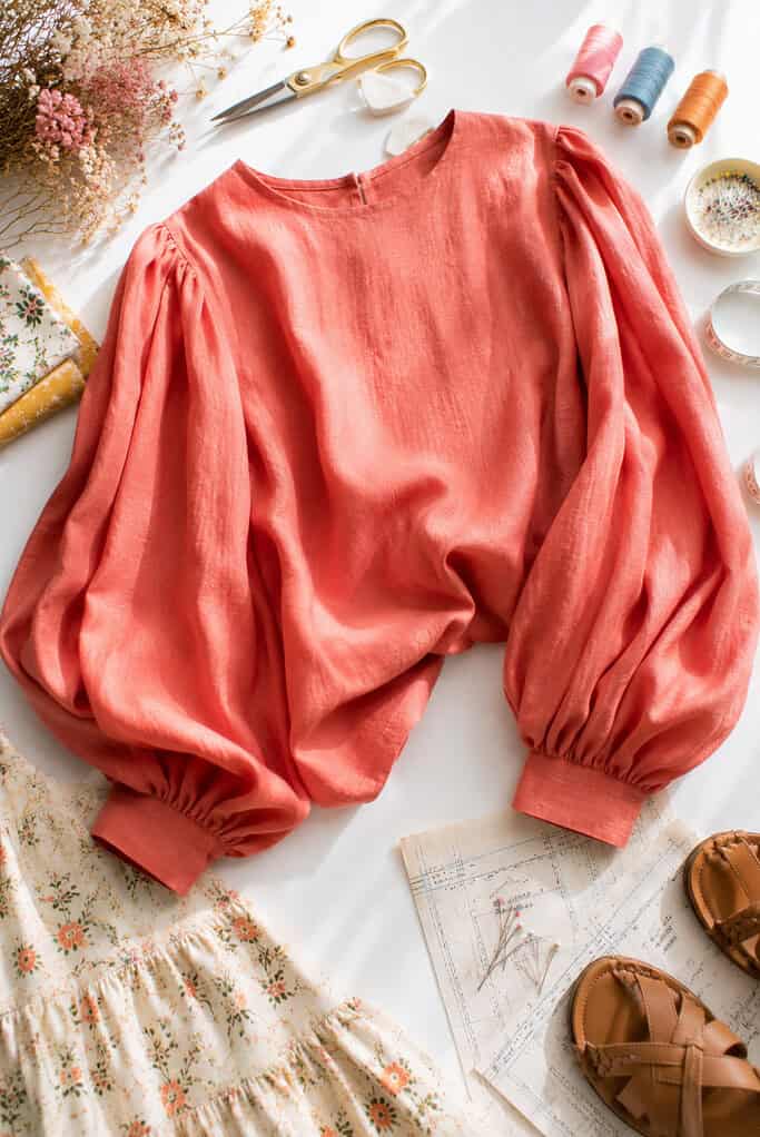 A beautifully sewn bishop sleeve blouse made from lightweight linen or loosely woven cotton