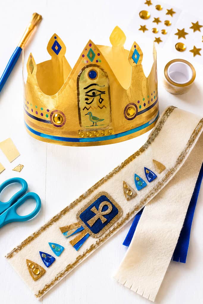 simple handmade crown and sash crafts created by children to represent Joseph being elevated by Pharaoh to second-in-command over Egypt.