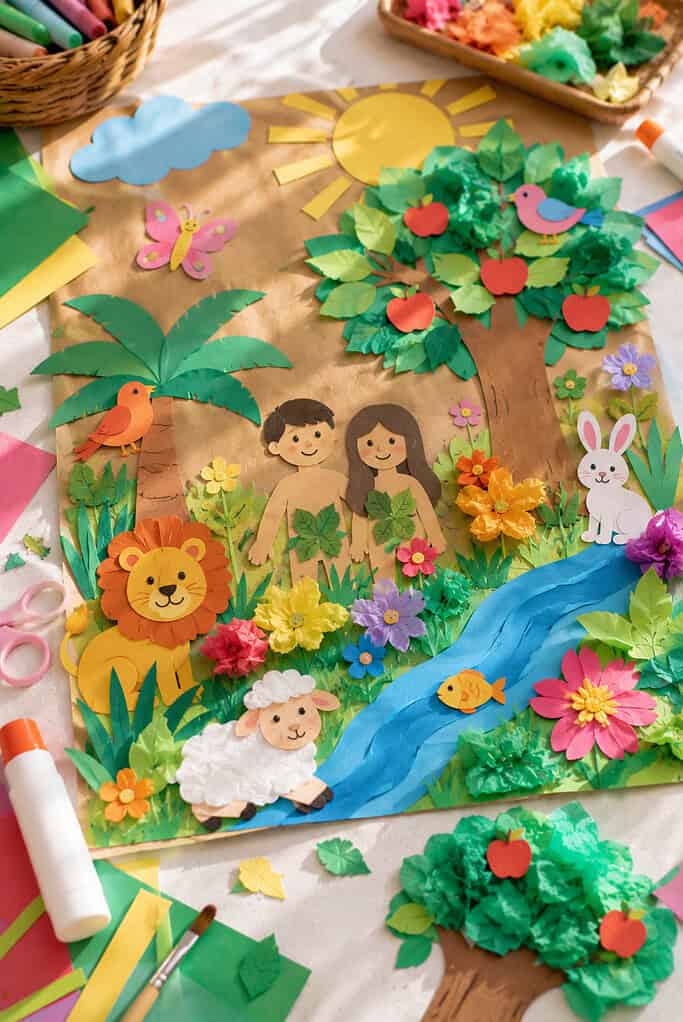 a large handmade Garden of Eden scene created on oversized paper or a brown paper bag backdrop.