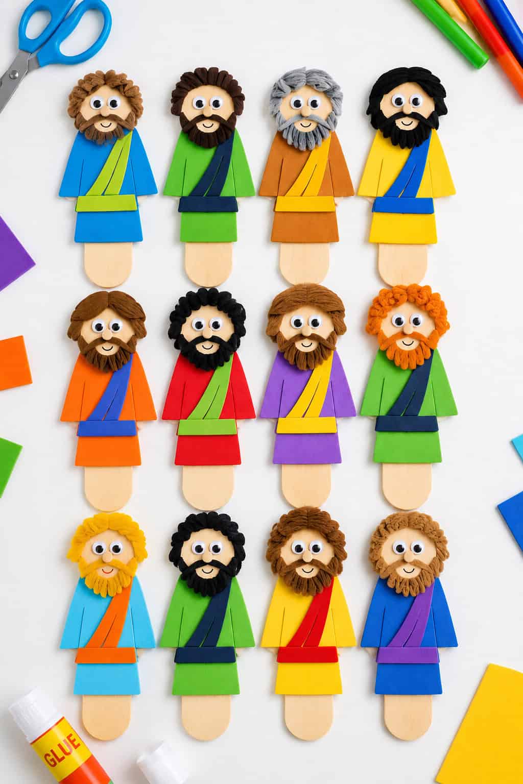 twelve distinct handmade disciple figures made from vibrant craft materials such as colored paper, popsicle sticks, foam sheets, markers, googly eyes, yarn, and stickers.