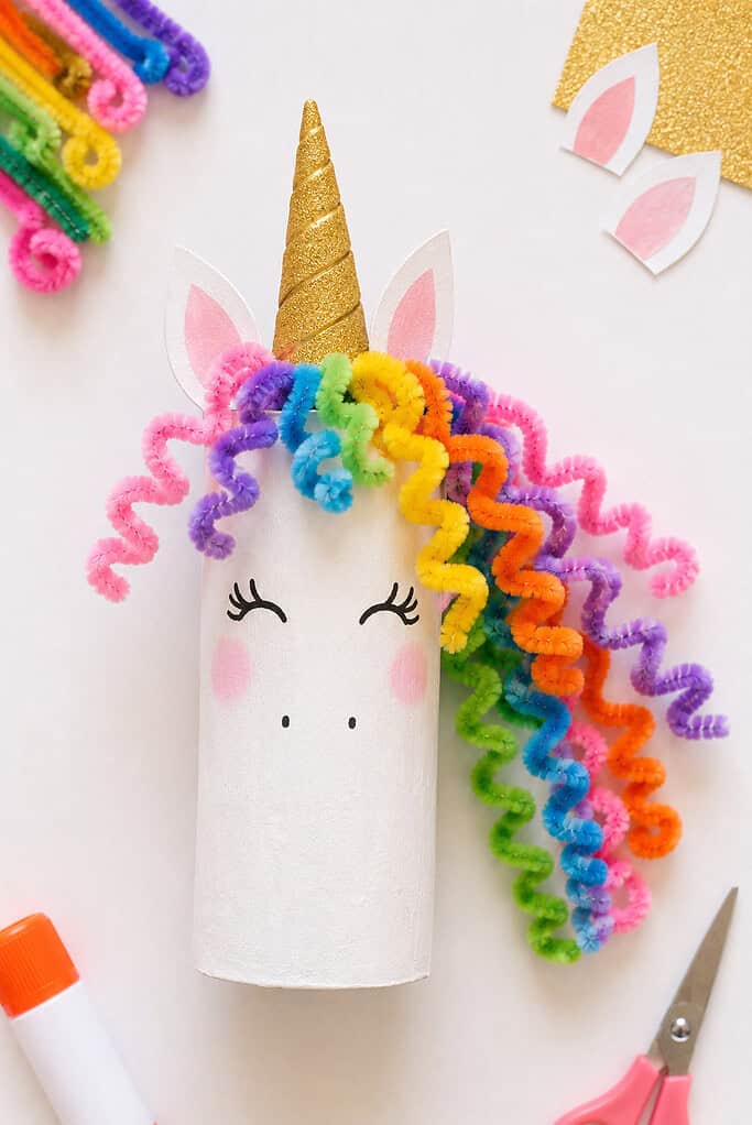 a recycled cardboard toilet paper roll painted bright white.