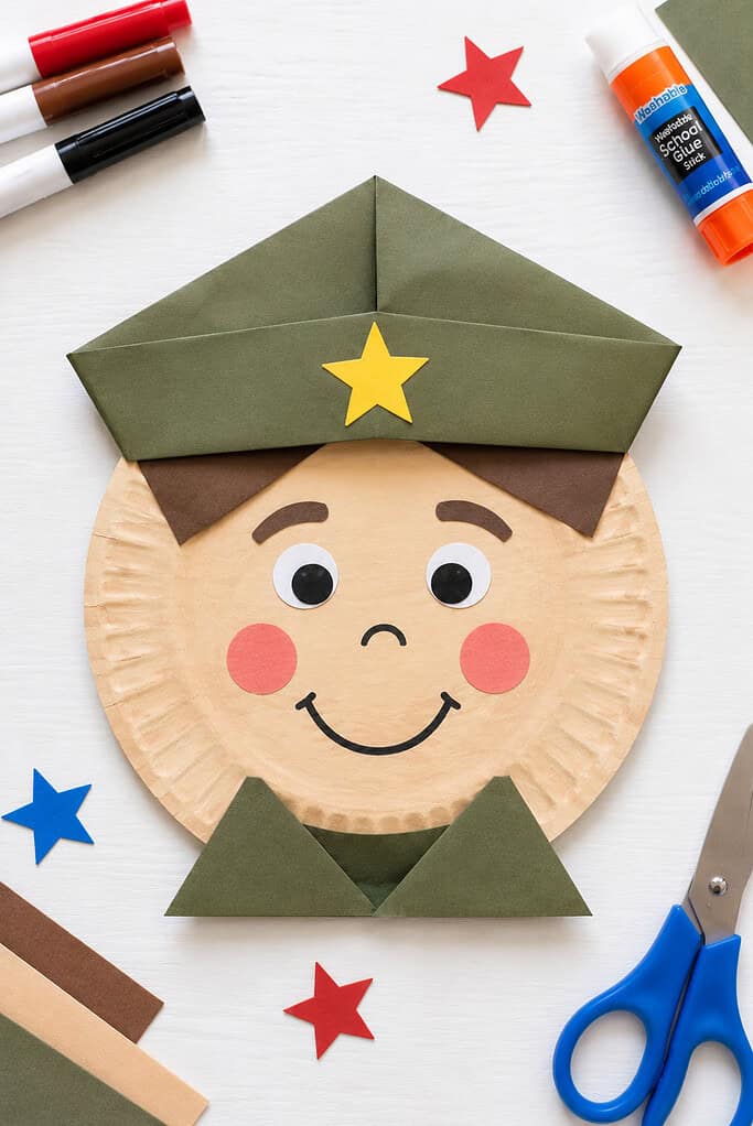 a paper plate transformed into a friendly soldier's face