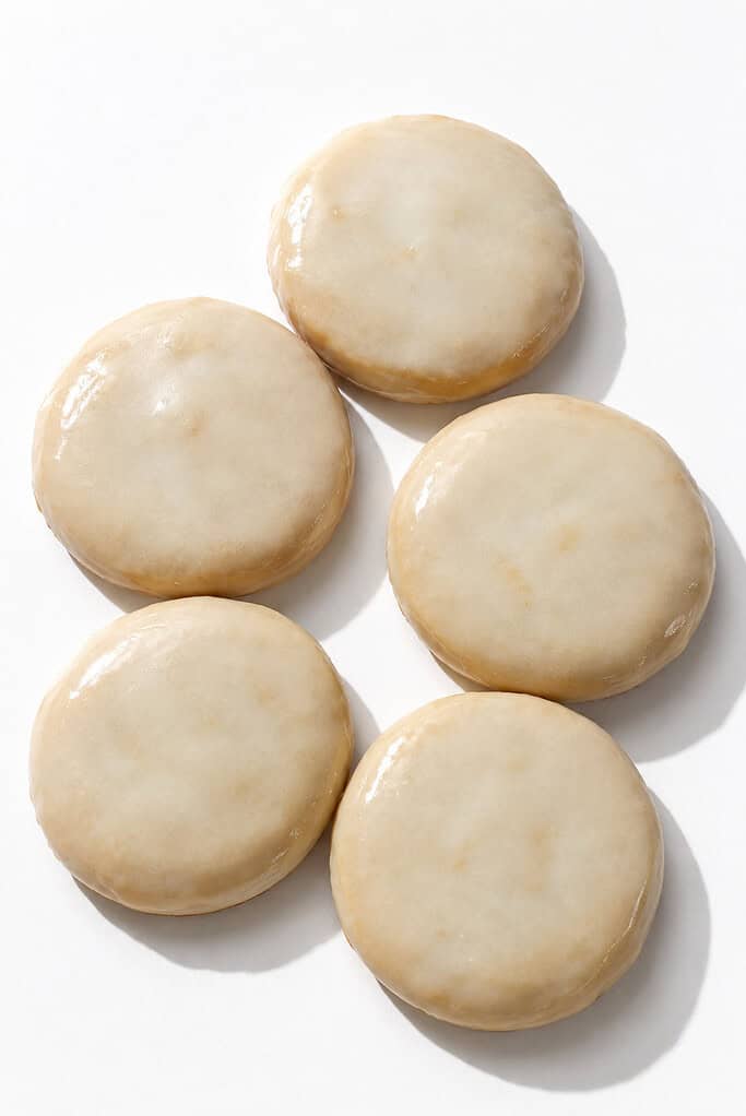 Round cookies coated in a smooth pale glaze to look like smooth stones.
